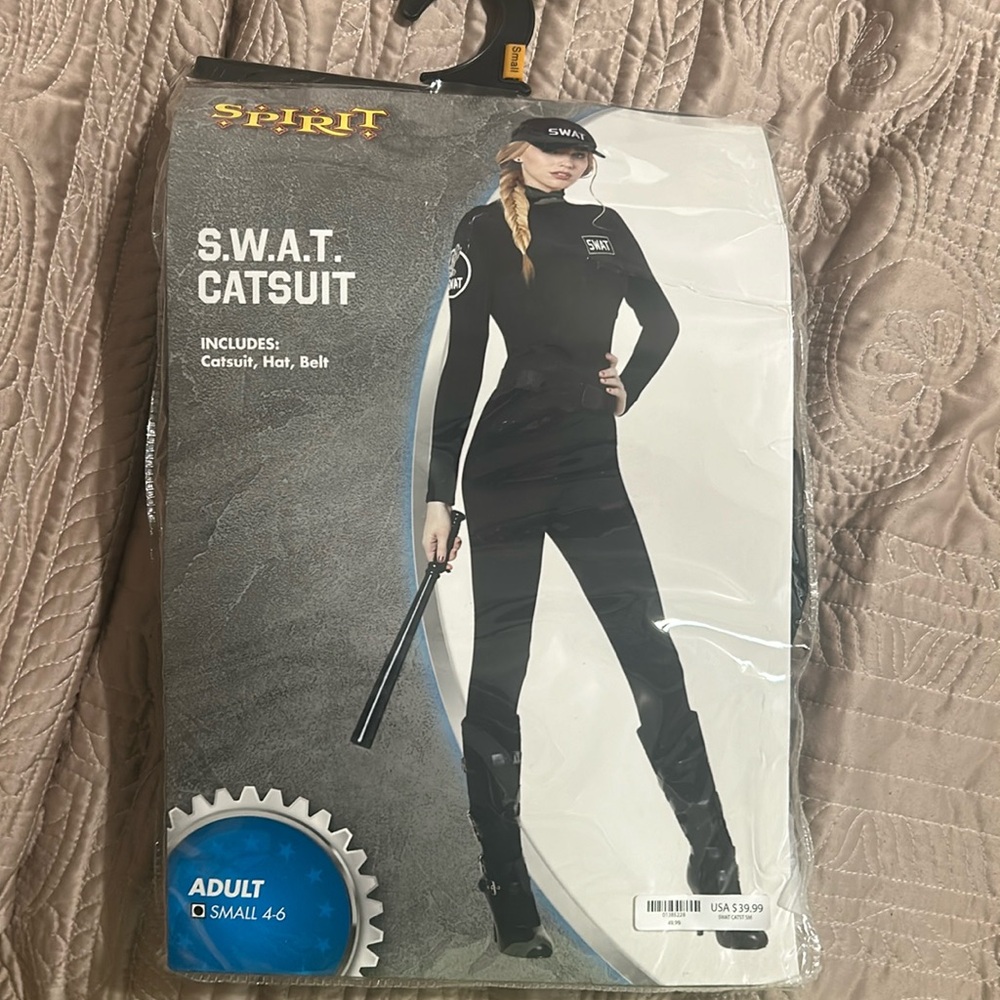Spirit of Halloween.  SWAT CATSUIT, includes catsuit,hat, &belt.  Almost new